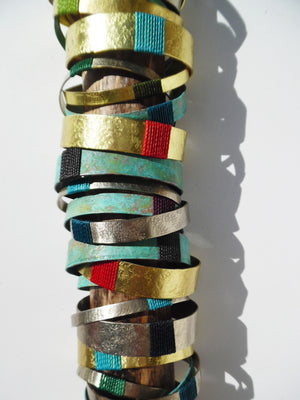 Bangles In Brass Patina And Alpaca Silver Linen Detail